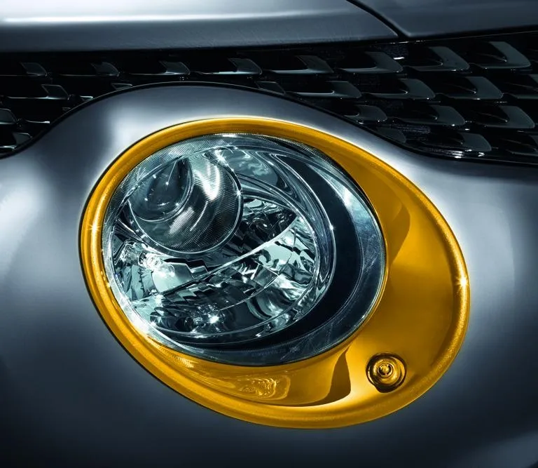 CERCLAGES DE PHARES (ÉQUIPÉES DE LAVE-PHARES) JAUNE NISSAN